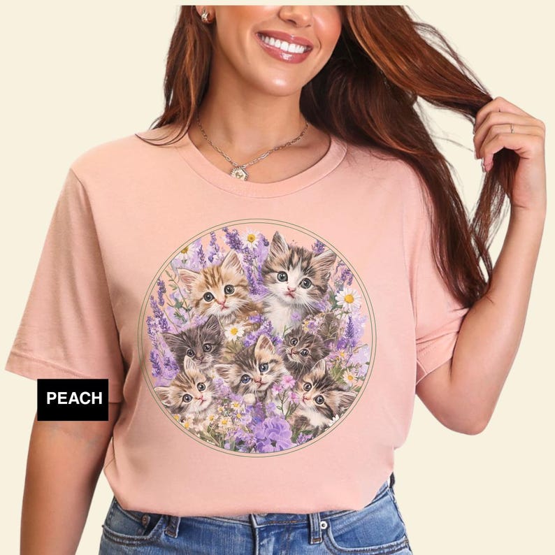 Bella+Canvas 3001 t-shirt with vintage kitten and wildflower design; lightweight, breathable, and perfect for summer cottagecore style. Perfect gift for cozy cottagecore cat lovers,  nostalgic cute floral shirt