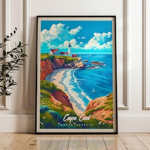 May include: A framed vertical art print featuring a coastal landscape with a white lighthouse on a cliff overlooking a blue ocean, sandy beach, and green hills. The text Cape Cod Massachusetts is printed in white at the bottom of the illustration.