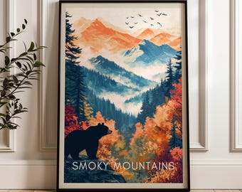 May include: A framed wall art print featuring a landscape of the Smoky Mountains with a black bear in the foreground, orange and blue mountain peaks, dense pine forests, and autumn foliage. The text SMOKY MOUNTAINS UNITED STATES is at the bottom.
