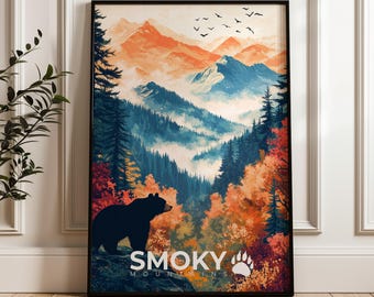 May include: A framed vertical wall art print depicting a landscape of the Smoky Mountains with a black bear in the foreground, orange and blue mountain peaks, pine trees, autumn foliage, and birds, with the text SMOKY MOUNTAINS and a bear paw print.