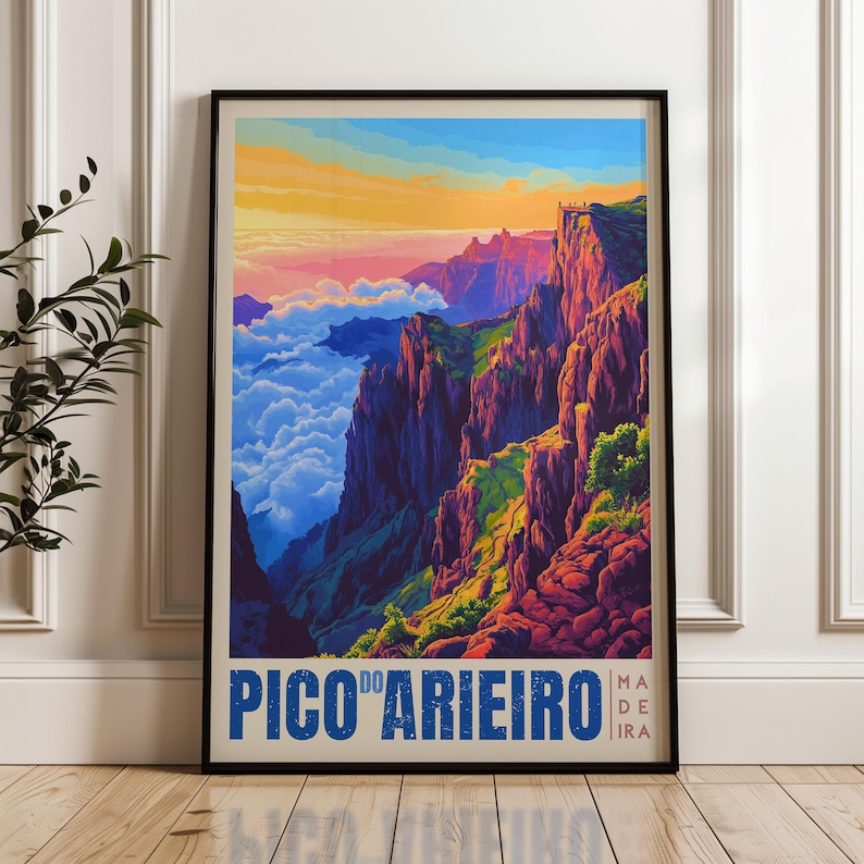 A stunning poster of Pico do Arieiro, Madeira, showcasing dramatic rocky cliffs bathed in golden sunset hues above a sea of clouds, with hikers standing on a distant peak. The vivid colors and elevated view create a breathtaking mountain scene.