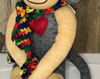 Adorable Yellow, Black and Gray sock monkey