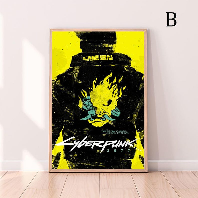 May include: A framed poster with a yellow and black design. The poster features the text "Cyberpunk 2077" and an image of a jacket with a flaming skull. The word "SAMURAI" is printed on the jacket.