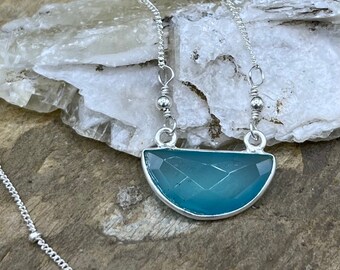 Small Sterling Silver Half Moon Shaped Aqua Blue Chalcedony Pendant with Sterling Satellite Chain.