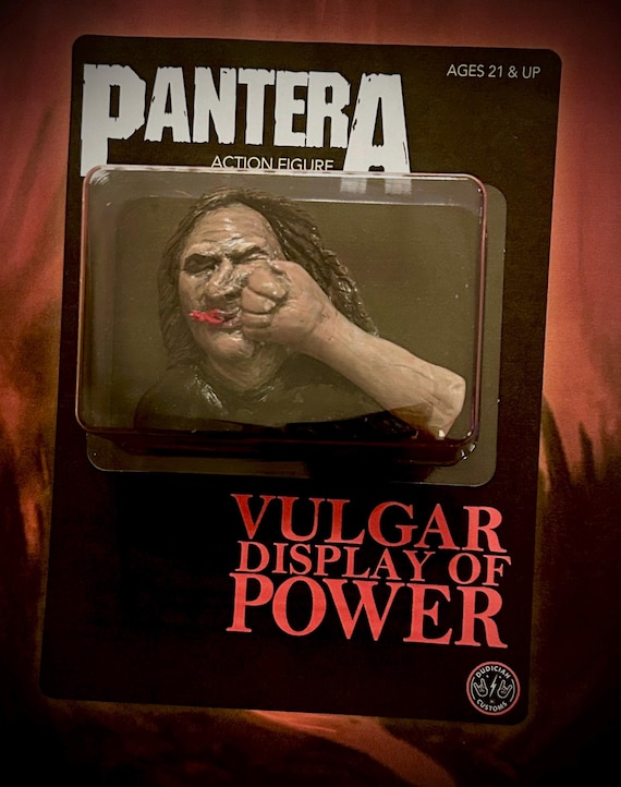 A hand-sculpted, one-of-a-kind custom Pantera action figure — the kind of hyper-niche fan art you absolutely cannot buy at any store, ever.