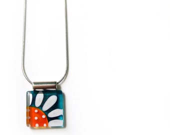 Flower glass pendant | teal and orange | daisy | on stainless steel chain | hand painted glass by azurine