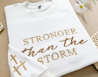 Stronger Than The Storm Sweatshirt or Hoodie,Christian Apparel,Christian Faith Gift,Christian Style Crewneck,Gift for HerCross On The Sleeve