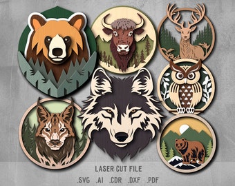 May include: A set of eight laser cut wood animal head designs. The designs include a bear, wolf, lynx, owl, deer, and yak. Each design is surrounded by a forest scene with trees and leaves. The text "LASER CUT FILE .SVG .AI .CDR .DXF .PDF" is at the bottom of the image.