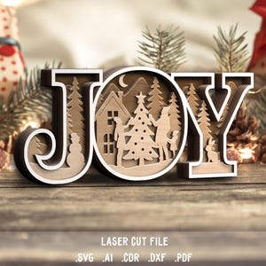 SVG de alegría. Archivo cortado a láser para Glowforge. Letrero navideño, decoración del árbol de Navidad, pueblo invernal, muñeco de nieve.