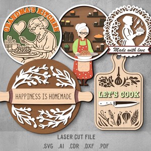 Puede incluir: Cinco letreros de madera cortados con láser con diseños de temática culinaria. Los letreros muestran a una mujer horneando, un rodillo con el texto "La felicidad es casera", una tabla de cortar con el texto "Vamos a cocinar", una mujer sosteniendo un pastel con el texto "Hecho con amor", y una mujer horneando con el texto "La cocina de la abuela".