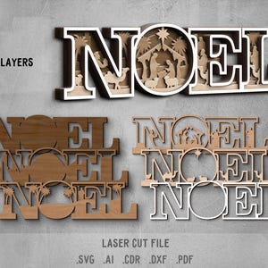 May include: Wooden laser-cut Christmas decor spelling "NOEL" with a nativity scene inside the "O". The design is multi-layered and includes the text "6 LAYERS" and "LASER CUT FILE".