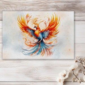 Op de afbeelding: Een aquarel schilderij van een feniks die uit de as herrijst. De feniks is afgebeeld met oranje, rode en blauwe veren, en zijn vleugels zijn wijd uitgespreid. De achtergrond is zacht blauw en wit, met hints van oranje en rood.