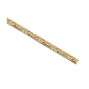 May include: A long, narrow, gold-colored metal strip featuring a repeating embossed pattern of stylized flowers and swirling scrollwork. The decorative trim has a flat back and a slightly rounded top surface with a metallic, reflective finish.