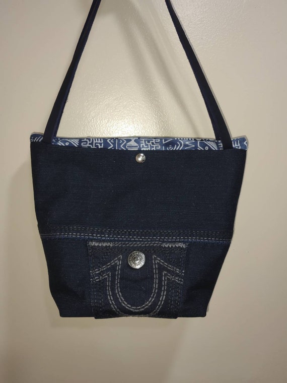Denim upcycled medium size handbag with insulation to keep your items cold or hot.