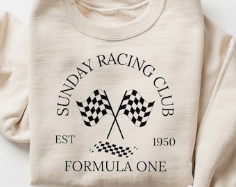 May include: A beige sweatshirt with a black graphic design that says "Sunday Racing Club Est 1950 Formula One" with a checkered flag design.