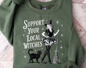 Sudadera divertida con mensaje "Apoya a las brujas de tu localidad", camiseta retro de bruja para niña, camiseta divertida de bruja para Halloween, regalo de Halloween para niña