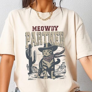 Meowdy Partner Whiskers In The Wind T-shirt, Cowboy Cat Shirt, Retro Cowboy Shirt, Western Cat Lover Gift, Funny Cowboy Cat Crewneck