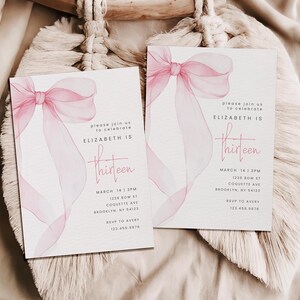 May include: Two pink and white watercolour invitations with a pink ribbon bow design. The text on the invitations reads "Please join us to celebrate Elizabeth is Thirteen." The invitations include the date, time, address, and RSVP information.