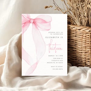 May include: Pink watercolour bow on a white background. The text "please join us to celebrate Elizabeth is thirteen" is printed on the invitation. The date and time of the event are listed as "March 14 | 3PM". The address is "1236 Bow St Coquette Ave Brooklyn, NY 54123". The RSVP information is "RSVP to Avery 123.456.9876".