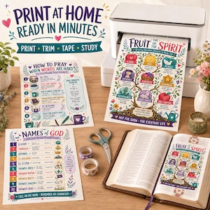 May include: A white printer outputting a Fruit of the Spirit chart, alongside printed sheets titled How to Pray When Words Are Hard and The Names of God, a pair of scissors, two rolls of patterned tape, and an open Bible with a matching chart.
