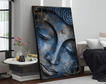 May include: A close-up of a blue and gray painting of a Buddha's face with closed eyes. The painting has a textured look and features gold accents.