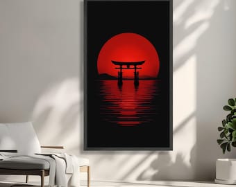 May include: Framed art print featuring a Japanese Torii gate silhouetted against a vibrant red sunset over water. The artwork has a minimalist style with a black frame, creating a striking contrast.
