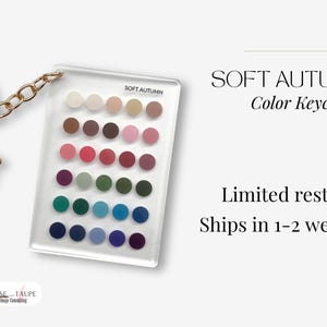 May include: A clear acrylic keychain with a gold-colored clasp and chain. The keychain features a color palette of soft autumn hues. The text "SOFT AUTUMN Color Keychain" is visible on the image.