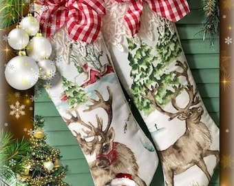 May include: Two Christmas stockings with reindeer and tree designs, topped with red and white gingham bows. A Santa Claus figurine stands below the stockings. The stockings are decorated with winter scenes.