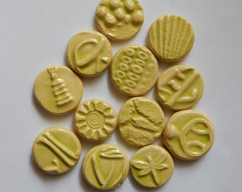 CLAY COINS...12 handmade embossed ceramic embellishments