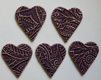 new heart shape...5 handmade embossed kiln fired earthenware clay hearts...purple glaze