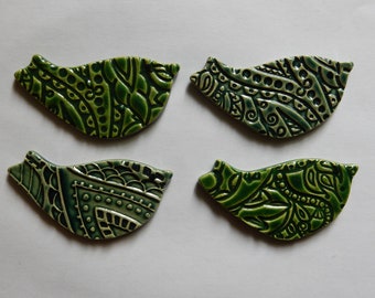 sweet little birds...4 handmade embossed ceramic mosaic tiles  (2 holiday green and 2 peacock colored glaze)