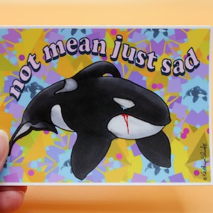 Pegatina: "No es malo, sólo triste". Triste orca.