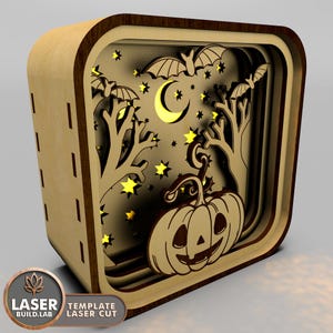 May include: A wooden Halloween-themed 3D layered lamp with a jack-o'-lantern, bats, and stars. The lamp is lit from behind, creating a warm glow.