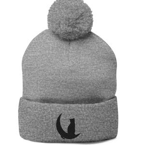 Witchy Embroidered Pom Pom Beanie Cozy Knit Winter Hat with Crescent Moon and Black Cat Embroidery Soft Fold Over Cap Gift for Her or Him