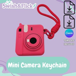 May include: A pink mini camera keychain with a red lanyard. The keychain has a circular lens and a rectangular body. The text "Mini Camera Keychain" is displayed on a light green background.