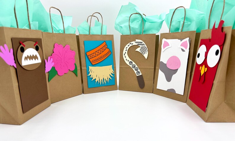 May include: Brown paper gift bags decorated with colorful cutouts of cartoon characters and tropical flowers. Each bag has a handle and is filled with teal tissue paper, perfect for a themed party.