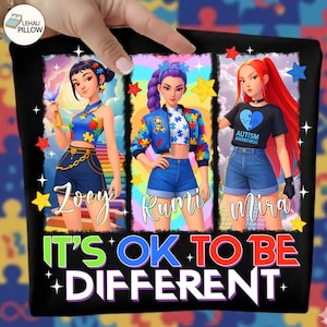 May include: Black t-shirt with the text "IT'S OK TO BE DIFFERENT" and three stylized female figures. The figures are wearing outfits with puzzle piece designs and the words "Joey", "Rumi", and "Mira". The shirt promotes autism awareness.