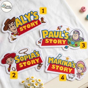 May include: Four custom embroidered patches featuring cartoon characters and the text 'ALY'S STORY', 'PAUL'S STORY', 'SOPIA'S STORY', and 'MARINA'S STORY' in yellow letters on red backgrounds, with numbered yellow tags from one to four.