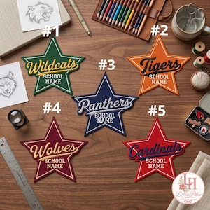 May include: Five star-shaped embroidered patches featuring team names: #1 Wildcats in green, #2 Tigers in orange, #3 Panthers in navy blue, #4 Wolves in maroon, and #5 Cardinals in red. Each patch includes the text SCHOOL NAME below the team name.