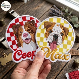 May include: Two circular embroidered patches featuring dog portraits. The left patch shows a brown and white dog with a red and white checkered background and the name Coop. The right patch shows a brown and white bulldog with a yellow and white checkered background and the name Max.