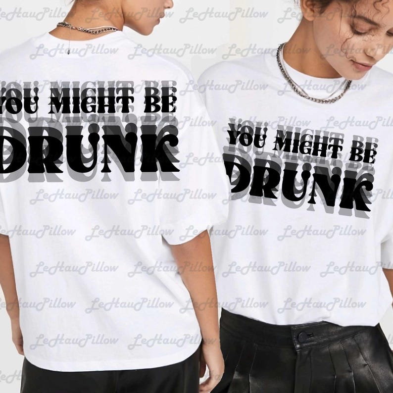May include: White t-shirts with the text "YOU MIGHT BE DRUNK" in a layered black and gray design. The shirts are a casual style, suitable for everyday wear.
