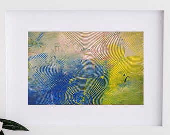 May include: Abstract painting with concentric circles in shades of blue, yellow, and green. The circles are painted in a layered style, creating a sense of depth and movement.
