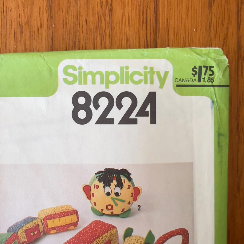 Simplicity Pattern 9124 Simplicity 8224 Stuffed Toy Telephone Clock Monkey Truck and Train ...