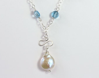 Freshwater Pearl Necklace: Sterling Silver Chain, Blue Topaz Accent