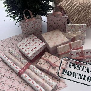 May include: A set of pink and white patterned gift boxes and wrapping paper with a reindeer design. The boxes are decorated with ribbons and bows. The wrapping paper is printed with a repeating pattern of reindeer and snowflakes. The text "INSTANT DOWNLOAD" is printed on a black rectangle.