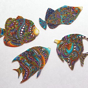 May include: Four colorful fish-shaped ornaments with intricate paisley patterns in shades of blue, green, orange, and purple. The ornaments are made of a hard, flat material and have a glossy finish.