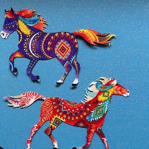 May include: Two colorful horse cutouts with intricate patterns and designs. One horse is primarily purple with orange, yellow, and blue accents. The other is red with green, yellow, and blue details. Both are on a blue background.