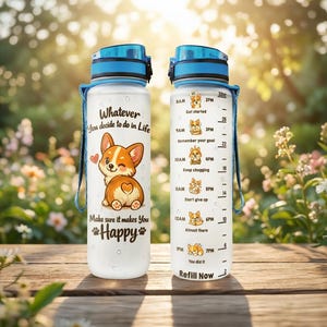 May include: A frosted 32oz water bottle with a blue lid and strap, featuring a cartoon corgi illustration, the text "Whatever You decide to do in Life Make sure it makes You Happy", and a time-based hydration tracker with small corgi icons.