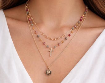 Triple Strand Gold Chain Necklace with gemstones, cross, & heart