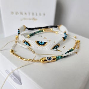 Pulsera ajustable apilable con cuentas de semillas Miyuki de ojo malvado azul protector de Donatella